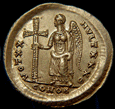 
coin with jewelled cross